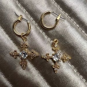 Pair of gold huggie earrings with crosses (that can be removed)